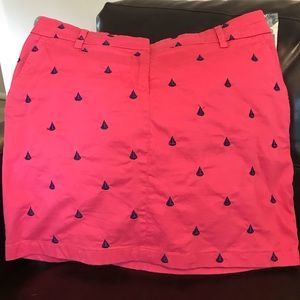 Coral pink skirt with blue sail boat embroidery